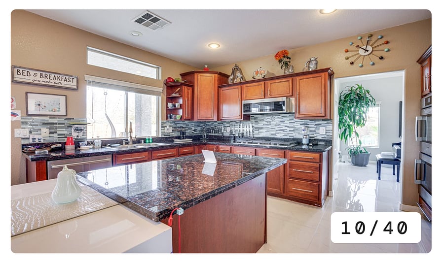 Enjoy a welcoming kitchen with classic granite countertops and modern stainless steel appliances. 