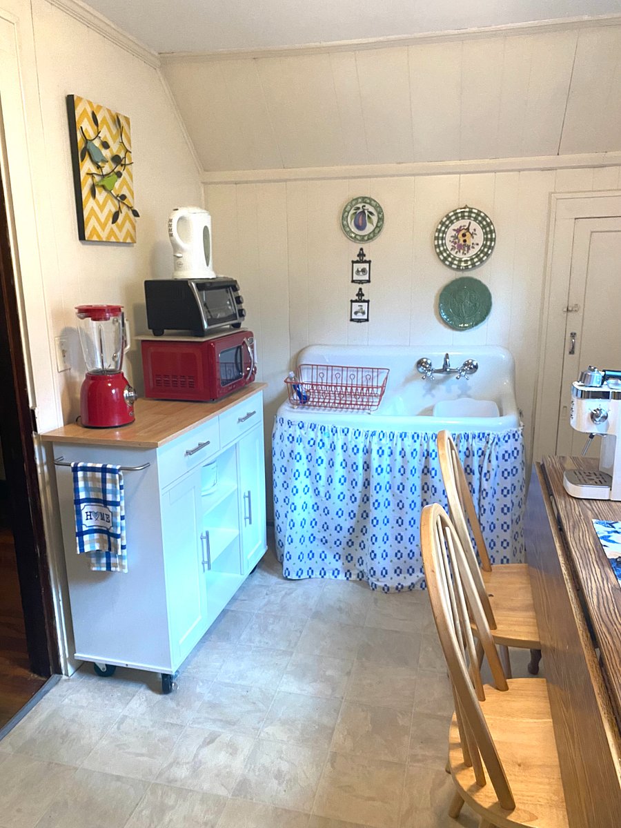 Kitchen with microwave, blender, toaster oven, coffee, expresso machine and full-sized 1940s fridge that works!