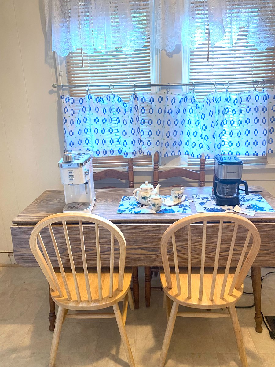 Kitchen table with expresso machine and coffee maker