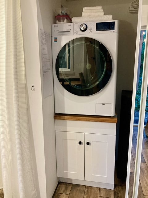 All-in-one, LG washer/dryer unit. Takes a little longer than standard to dry, but works great!