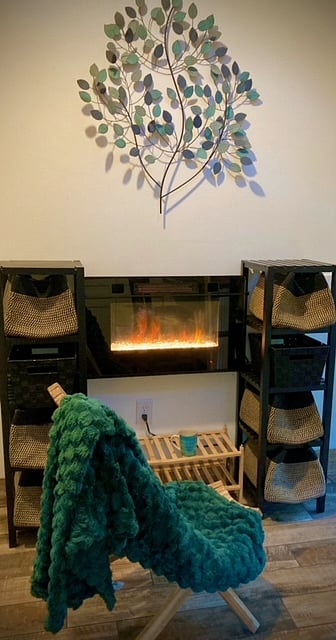 Fireplace is also the heater. Many color and speed options for the flame. Operated by remote.
