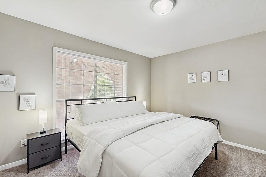 Second bedroom on first floor has access to half bath on first floor and shared bath upstairs.