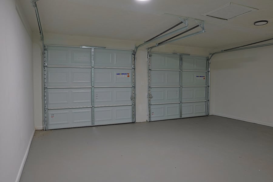 2 car garage which can be used for storage(for additional fee). There is a large parking area enough to accommodate 6 cars in front. Street parking is available as well.