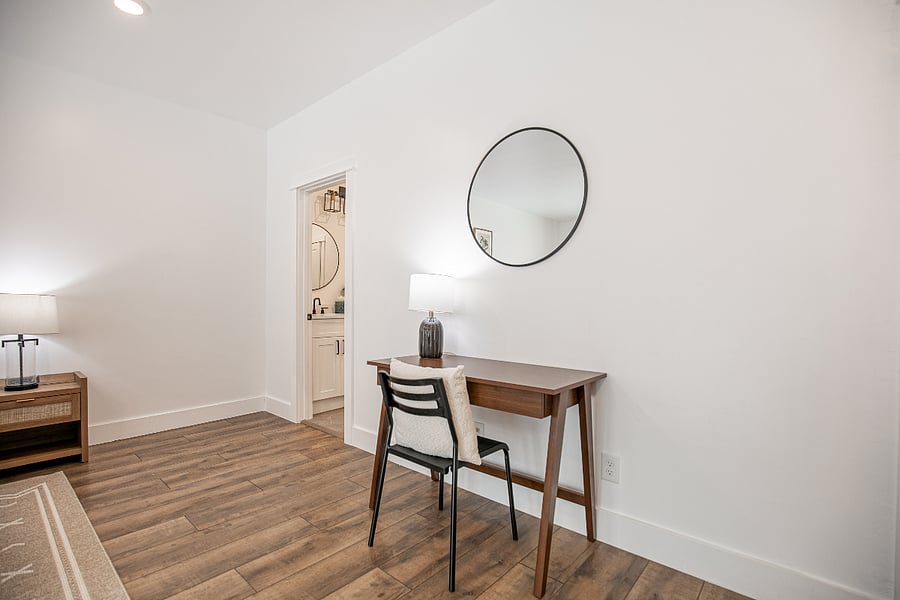 A desk is included in the master bedroom