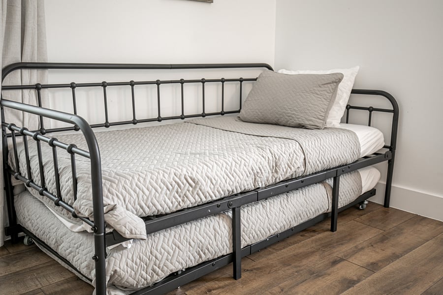 Twin trundle bed includes 2 luxury hybrid memory foam mattresses for additional sleeping by capacity