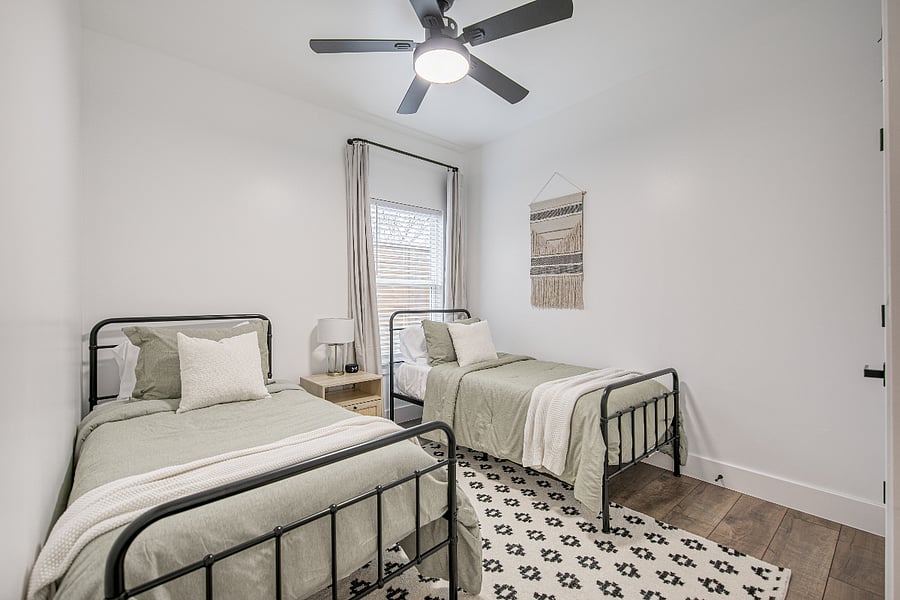 This room features two luxury hybrid memory foam twin beds, an alarm clock, sound machine, full length mirror, and black out curtins. Hangers and luggage racks are included in the closet