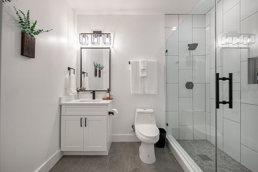 Second master bath includes provided towels, starter shampoo, conditioner, and body wash for your stay.