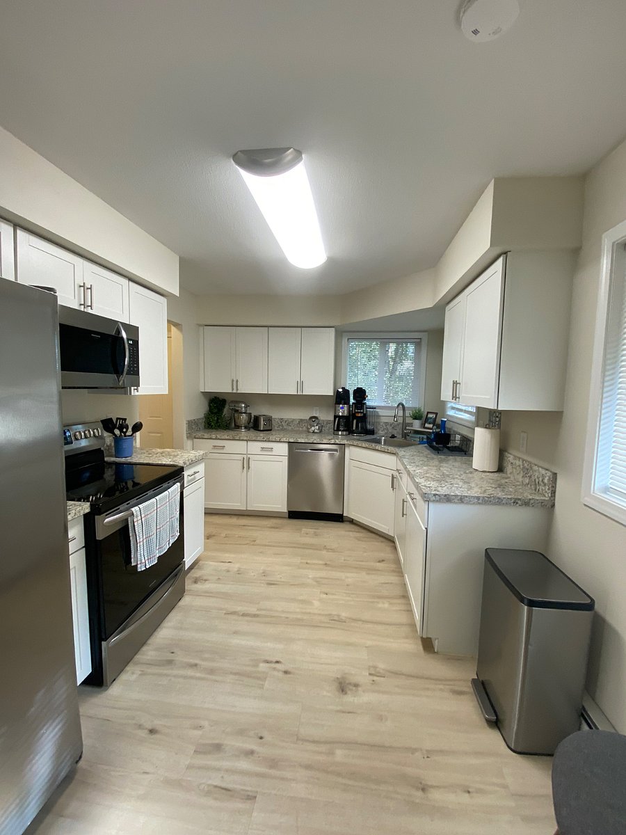Kitchen, Including Kitchen Aide Mixer, 2 Coffee Pots, Pots and Pans, Full Service of Glasses and Dishes, and more.