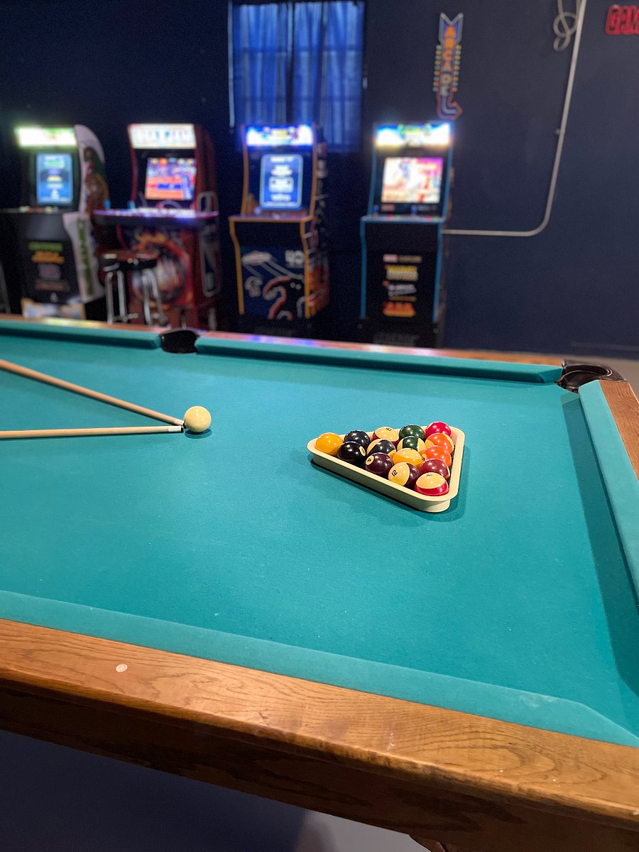 Game Room with Pool table and Arcade Games
