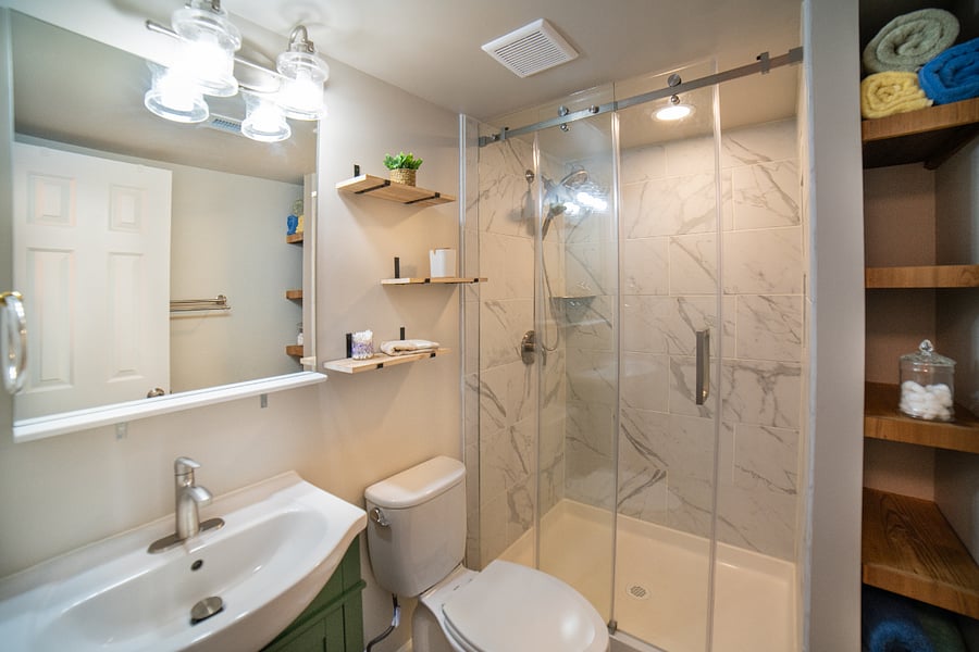 Second bathroom, double shower head (with hand-held option)