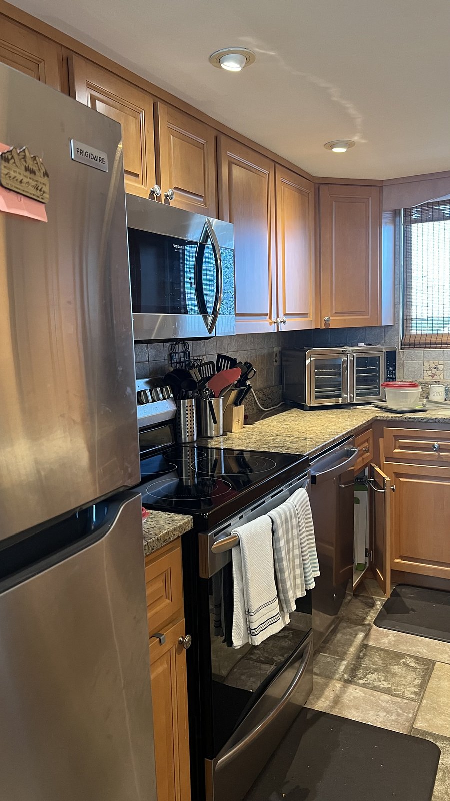 Kitchen cooking area with granite counter tops