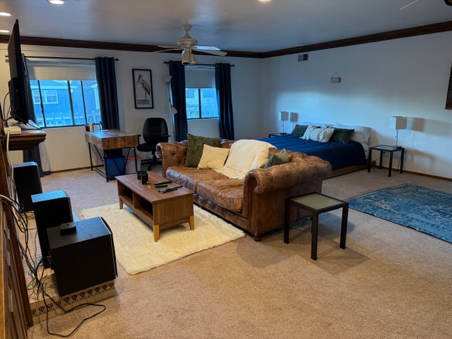 extra large private master suite - with tv/couch area, and a dedicated work space