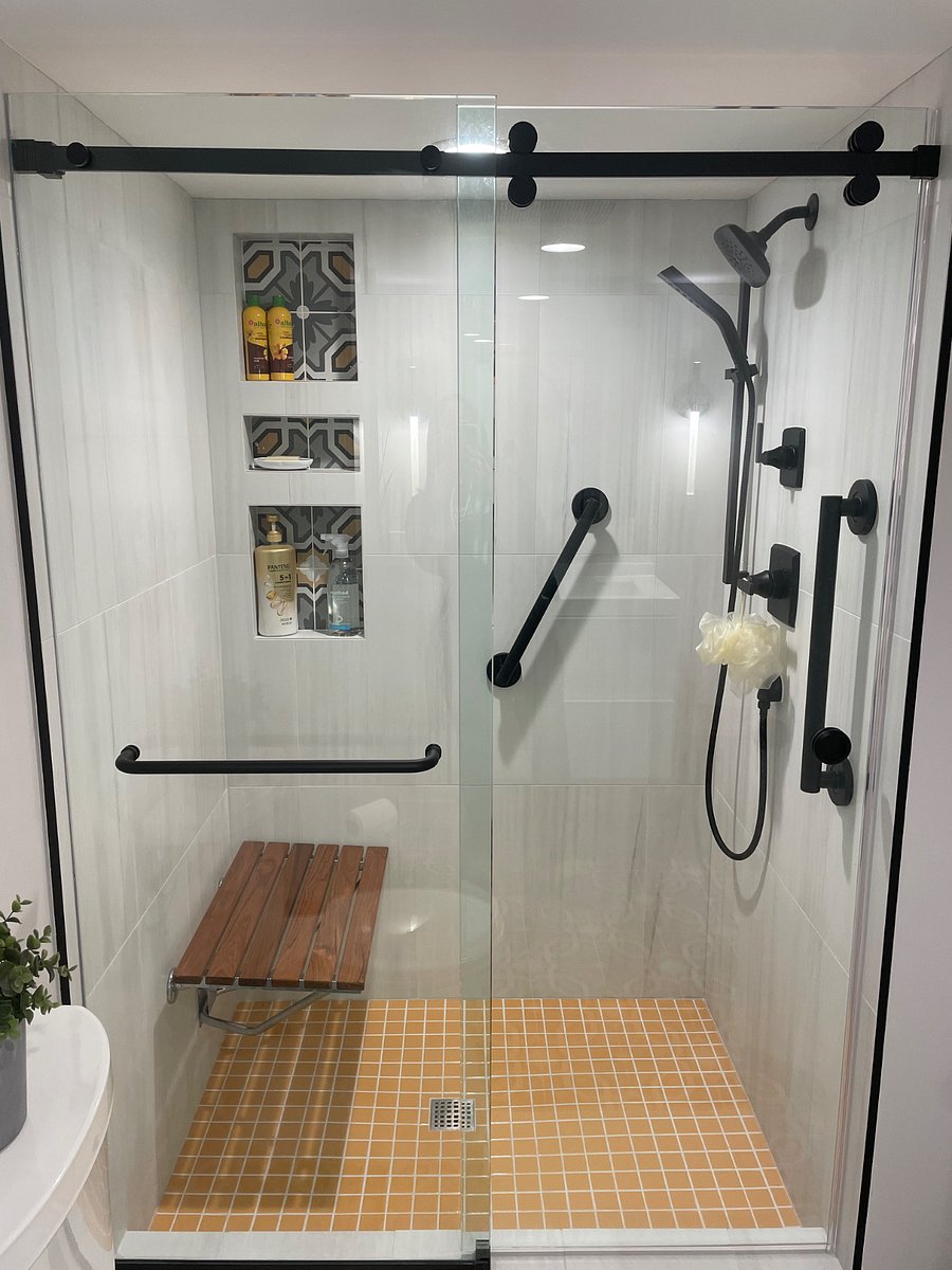 Spa-like shower with bench to relax after a long day!