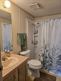 Full size bathroom with walk in shower