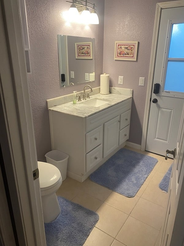 Bathroom with exit door to patio
