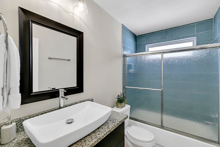 This bathroom has been updated to a shower.