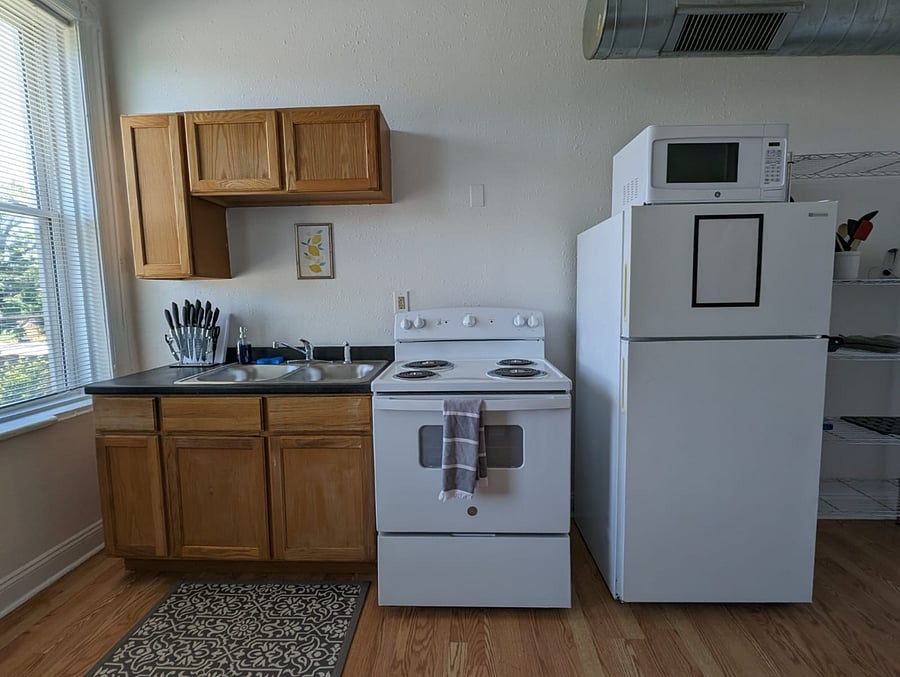 Our kitchen is cozy, where you can enjoy cooking delicious food!