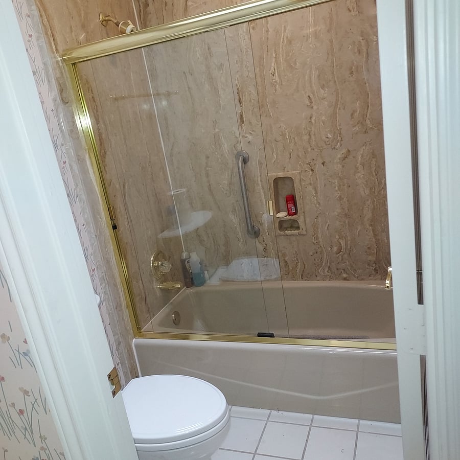 Bedroom 3 shower/tub & toilet