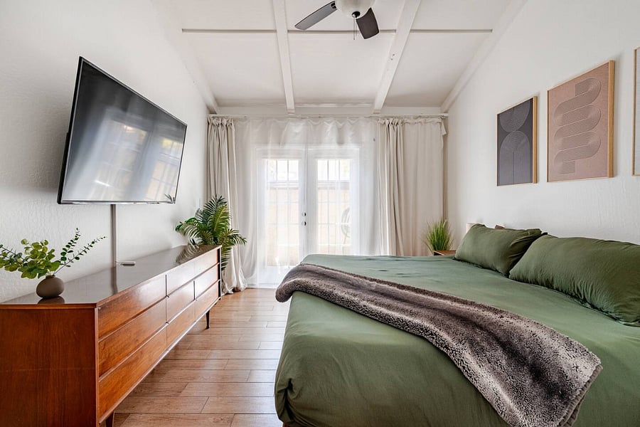 Master Bedroom with King Size Bed and 65" Smart TV