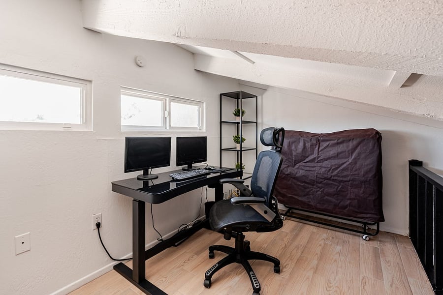 Adjustable Standing Desk with Dual Monitor setup, Docking Station, wireless Mouse and Keyboard, and ergonomic Office Chair