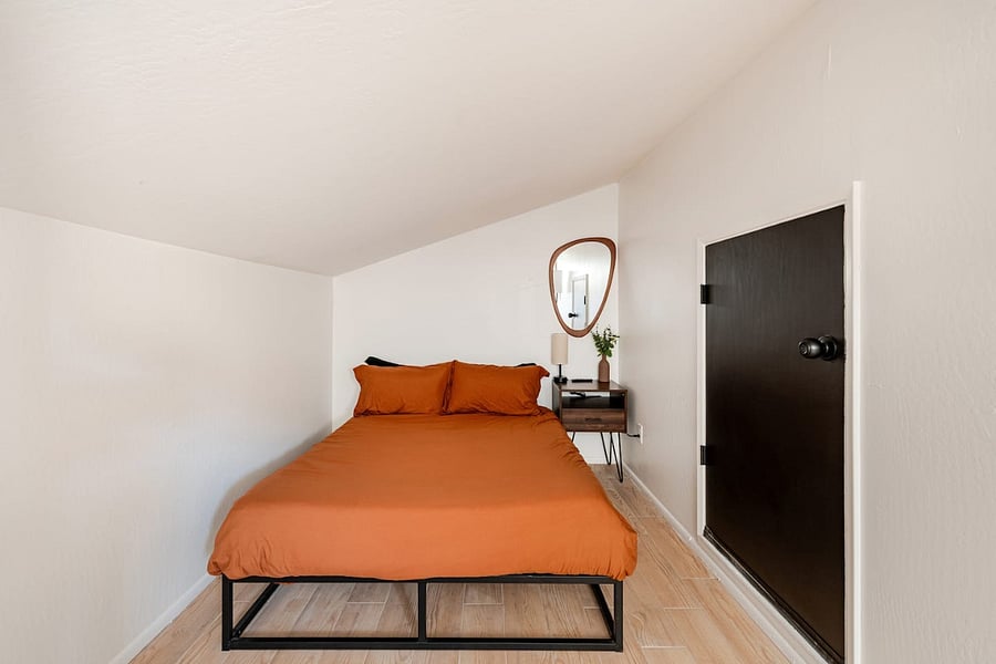Full size bed in upstairs loft area. Please be mindful ceilings are low on one side