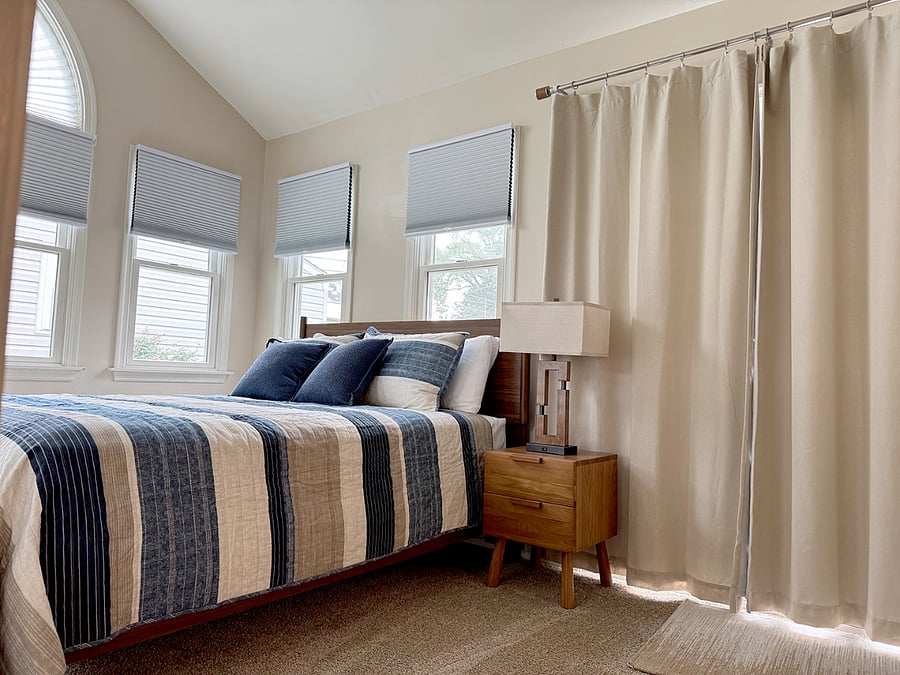 Main Floor Bedroom (sliding door to Back Deck is behind the curtain)