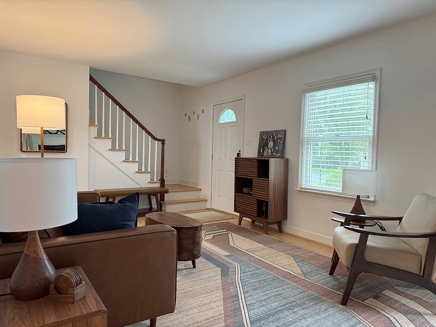 View of Front Door and Stairs from Living Room