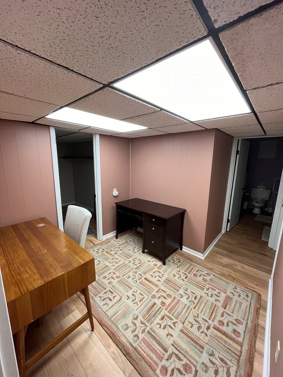 Desk room between bedroom and bathroom. Outlets are plenty for any work space or storage thats needed.