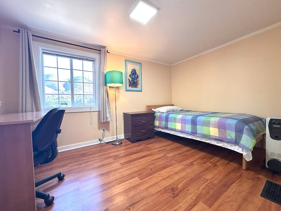 Bedroom 2 features a twin-size bed and a laptop-friendly workspaceperfect if you have to get some work done.
