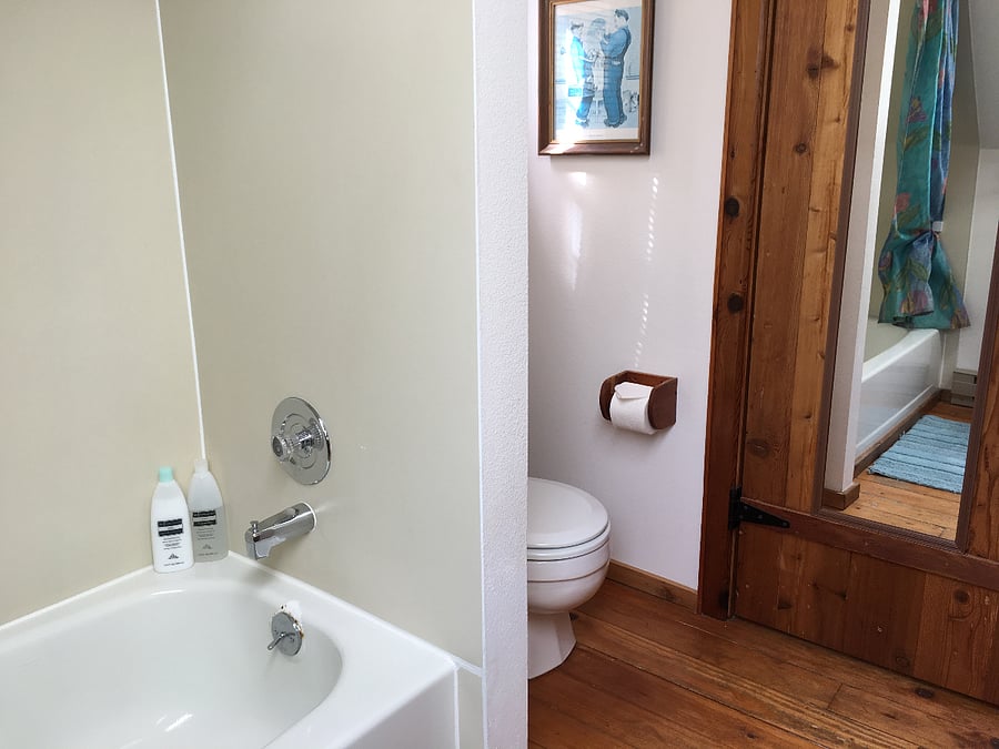 Bathroom off of upstairs loft bedroom - tub/shower combo.