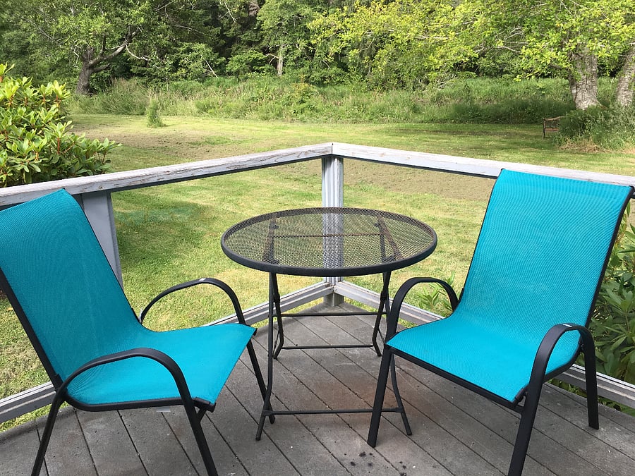 Deck off of the back side of house.  