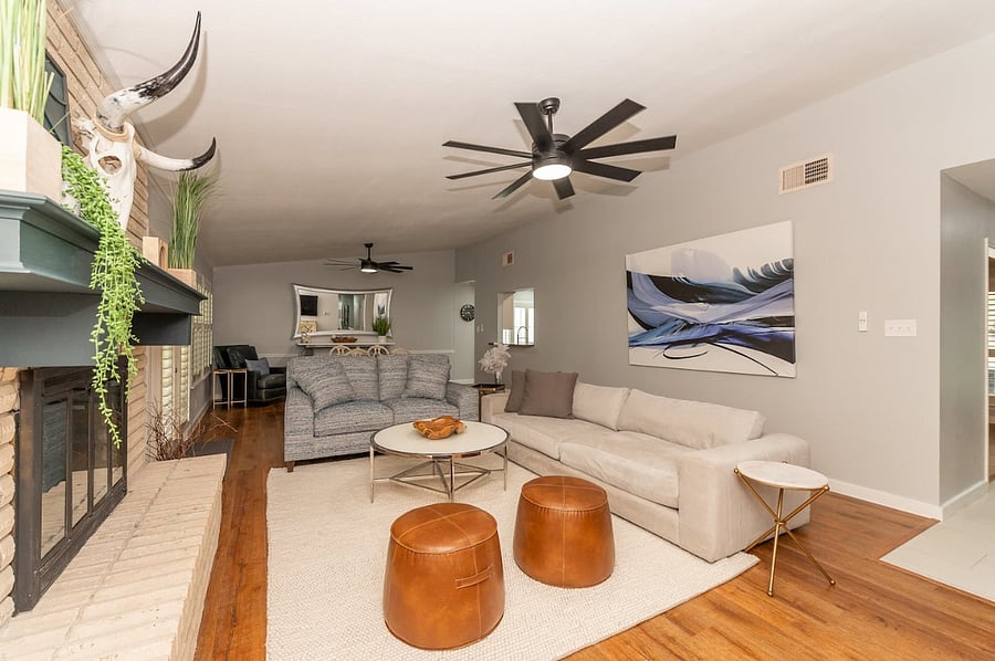 Open layout connects seamlessly to the kitchen and dining areas, ideal for entertaining groups or families.