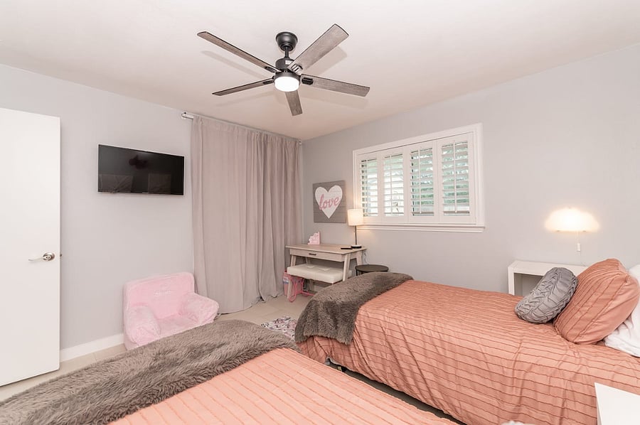 Perfect for kids or singles three cozy beds in a bright, cheerful room with smart layout. 2. Twin bunk + single bed = flexible sleeping arrangements for families or groups. 3. Smart TV, ceiling fan, and playful touches make this a fun.
