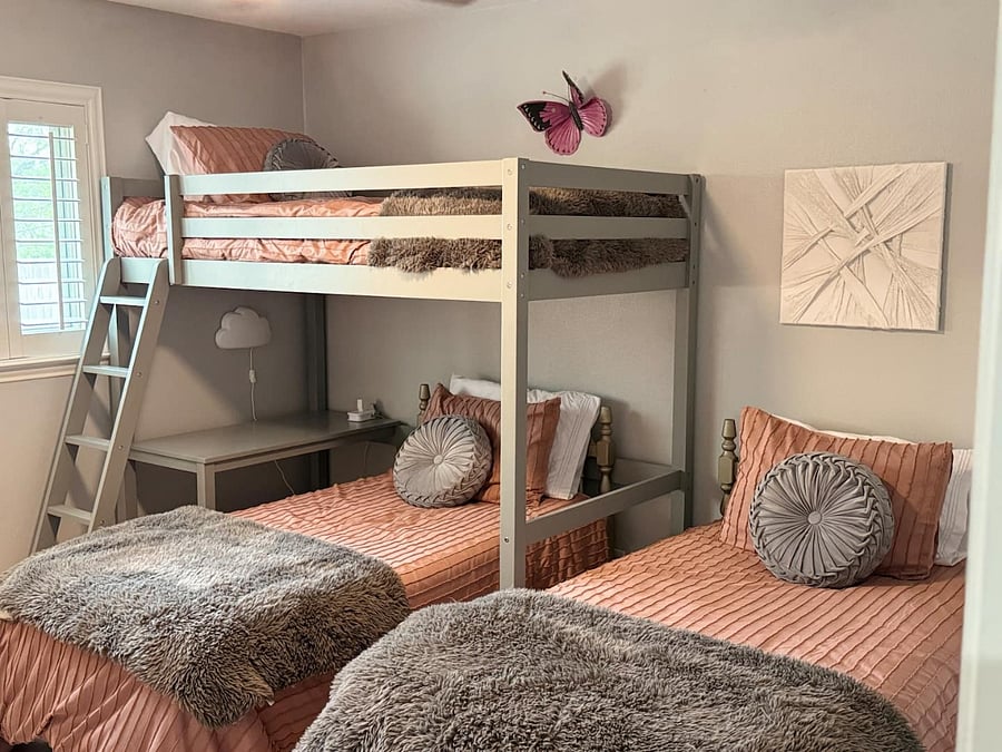 3 twin beds and desk