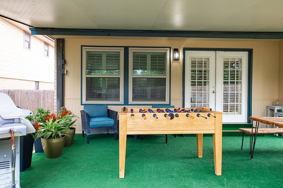 Foosball table and backyard games provide hours of entertainment for both kids and adults.