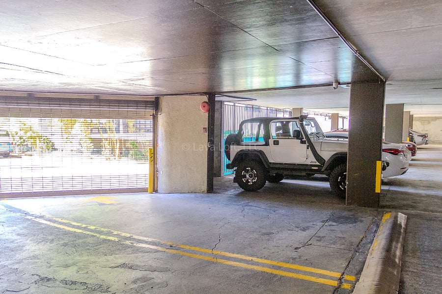 The white Jeep marks your designated parking spot, conveniently reserved just for you.  (Jeep not included)