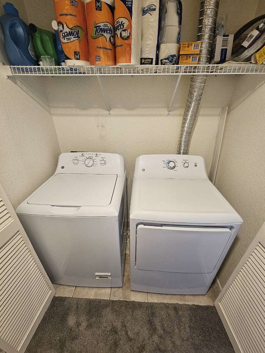 In unit washer and dryer stocked with laundry soap, fabric softener and dryer sheets. Also has extra paper towels and toilet paper