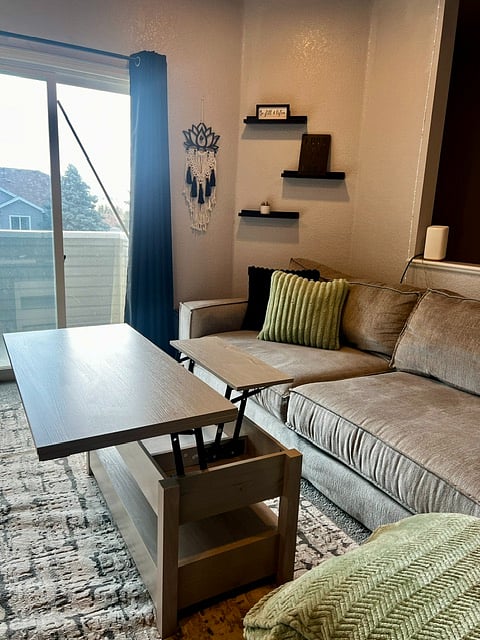 Coffee table opens into a desk or bigger table