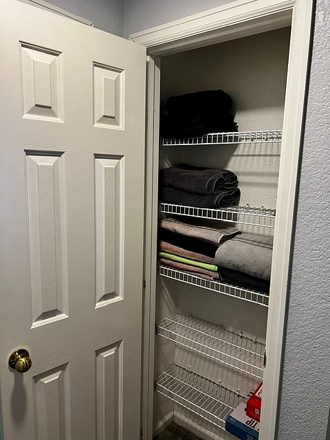 Linen closet with plenty of extra towels. There are also extra sheets and blankets in another closet 
