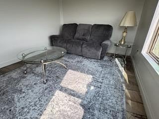 3 season porch with reclining couch for entertaining or relaxing