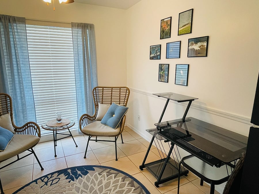 Flex space set up as a reading room and office space