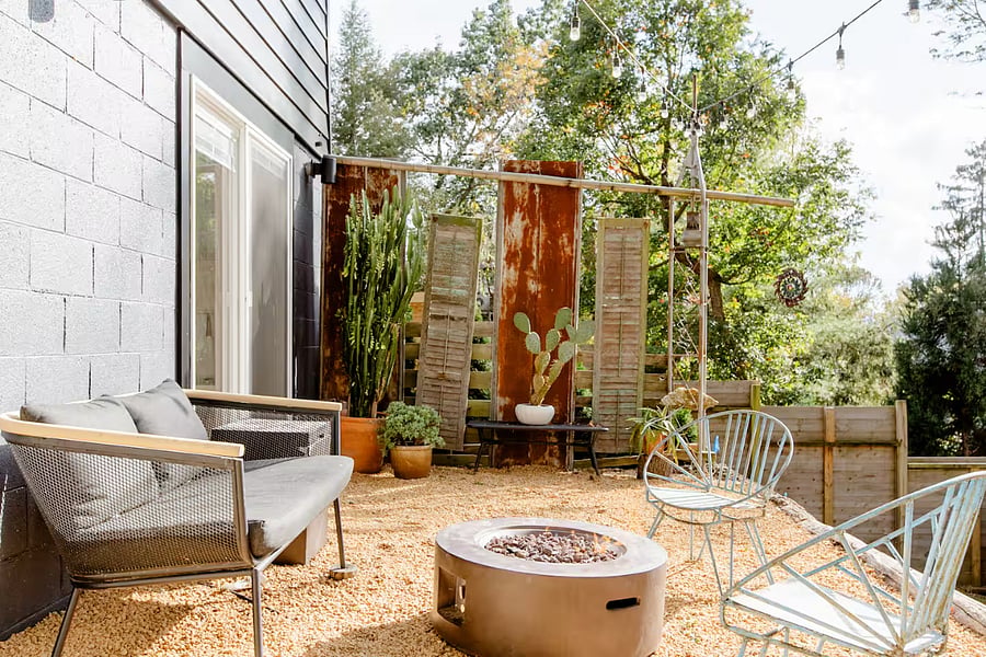 The patio includes outdoor furniture, a fire pit, and a grill (not pictured) for your use.