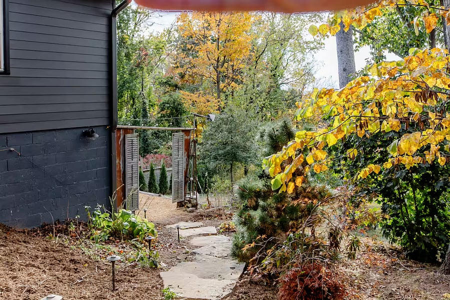 The approach to your private patio from the stone stairway.