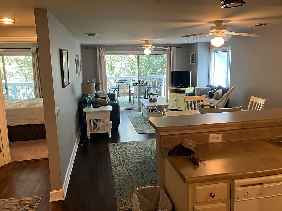 Living area with sliding glass door to back porch