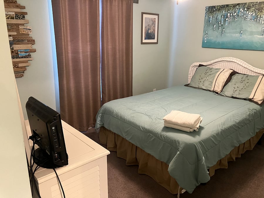 second bedroom with queen bed