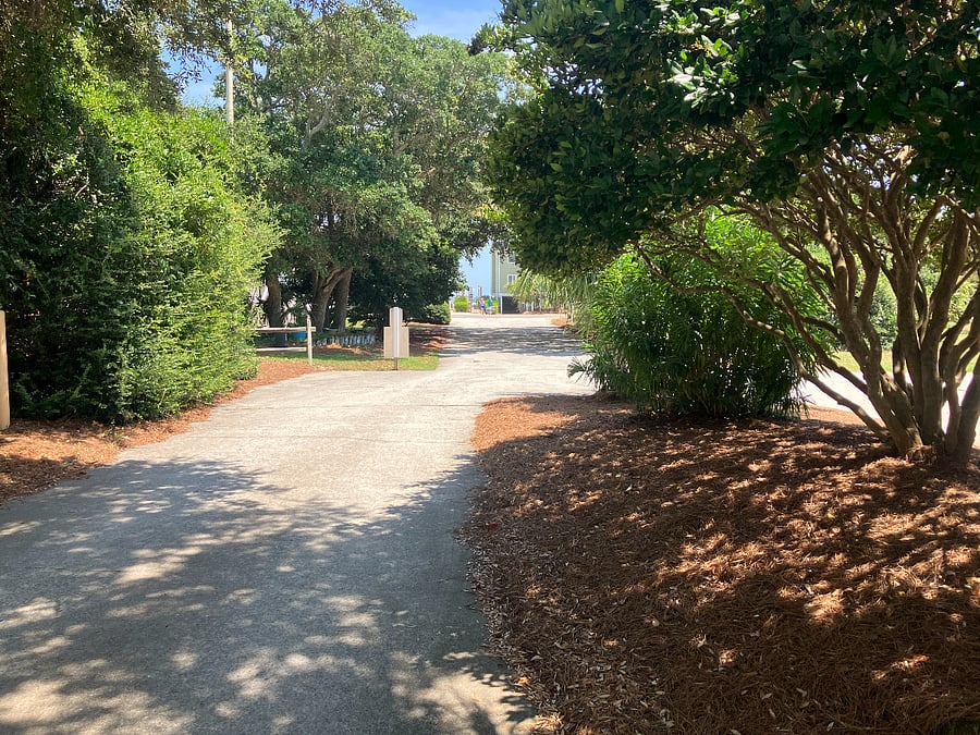 entrance to property with beach access in the background