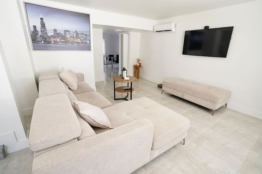 Cozy living room with a clear view of the TVperfect for movie nights or binge-watching your favorite shows.