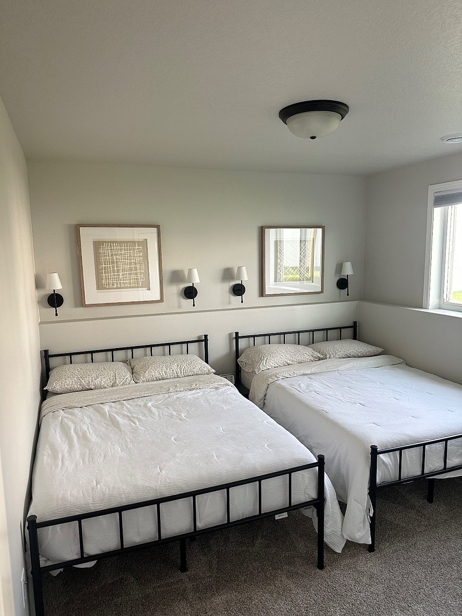 Downstairs bedroom with two full sized beds