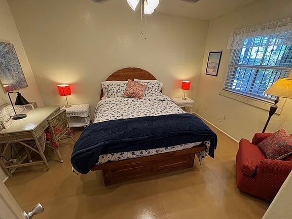 Back bedroom with queen bed and closet. 