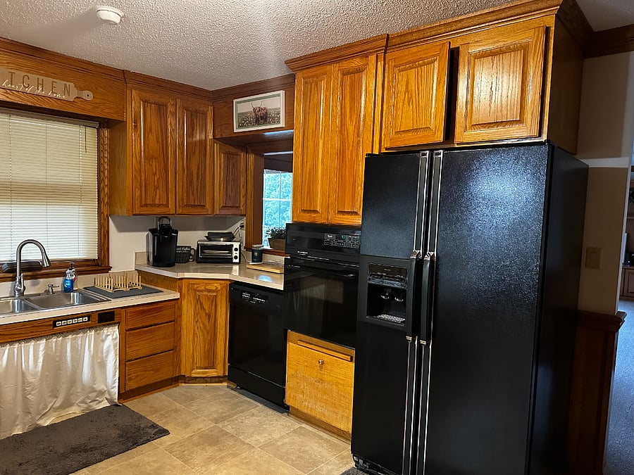 Kitchen has lots of cabinet space in addition to what is pictured.  The sink is also slightly lowered to accommodate wheel chair accessibility. 